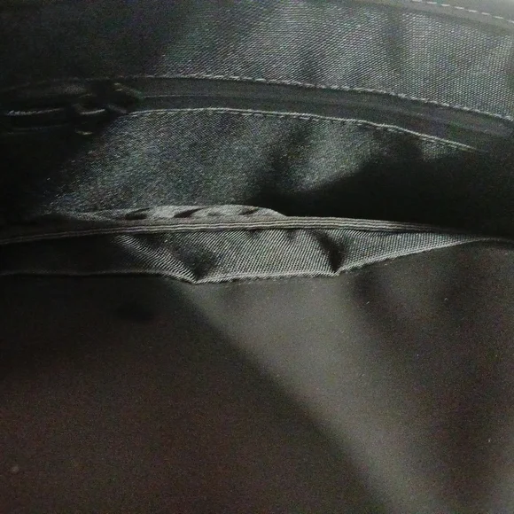 Rains Black Minimalist Backpack with Flap Closure
